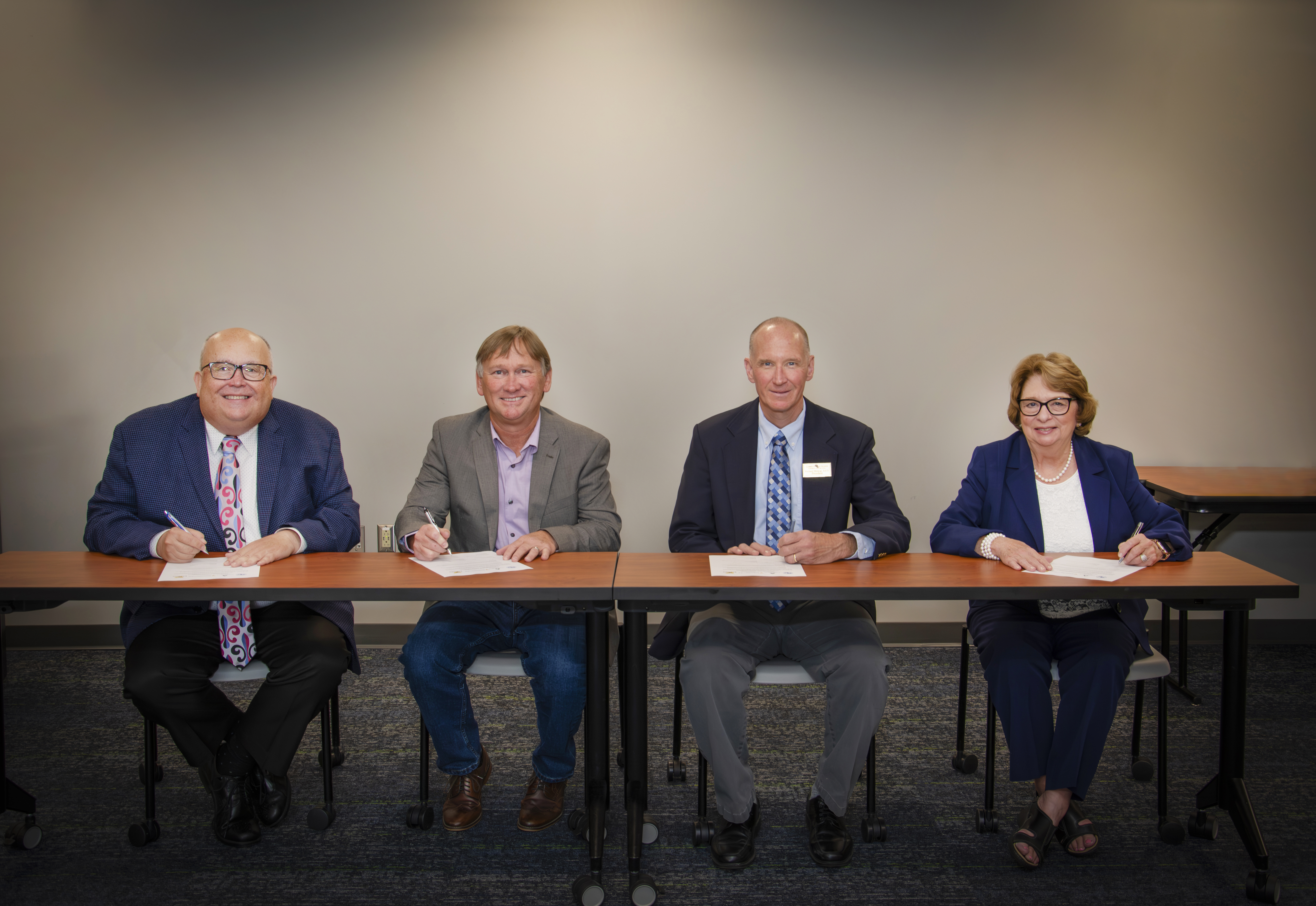 Local colleges sign partnership agreement partnership